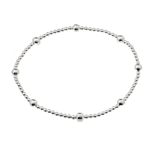 Silver beaded bracelet with 8 larger beads evenly spaced between a section of smaller silver beads on a white background